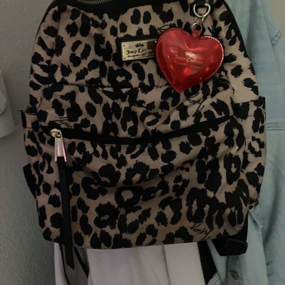 EUC Juicy Couture animal-print w/ heart backpack.. No pets, No smoking..